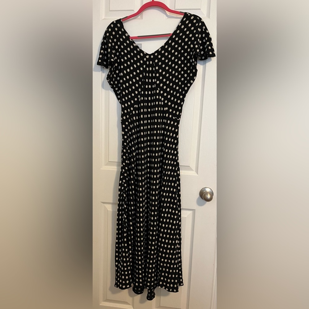 Elegant, sophisticated simple flowy and flattering black polka dot dress